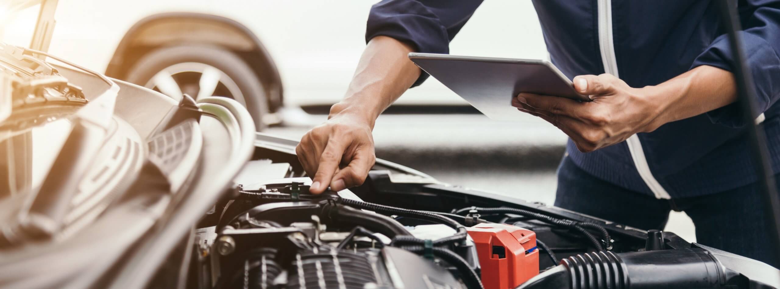 Automobile mechanic repairman hands repairing a car engine automotive workshop with a wrench, car service and maintenance,Repair service.