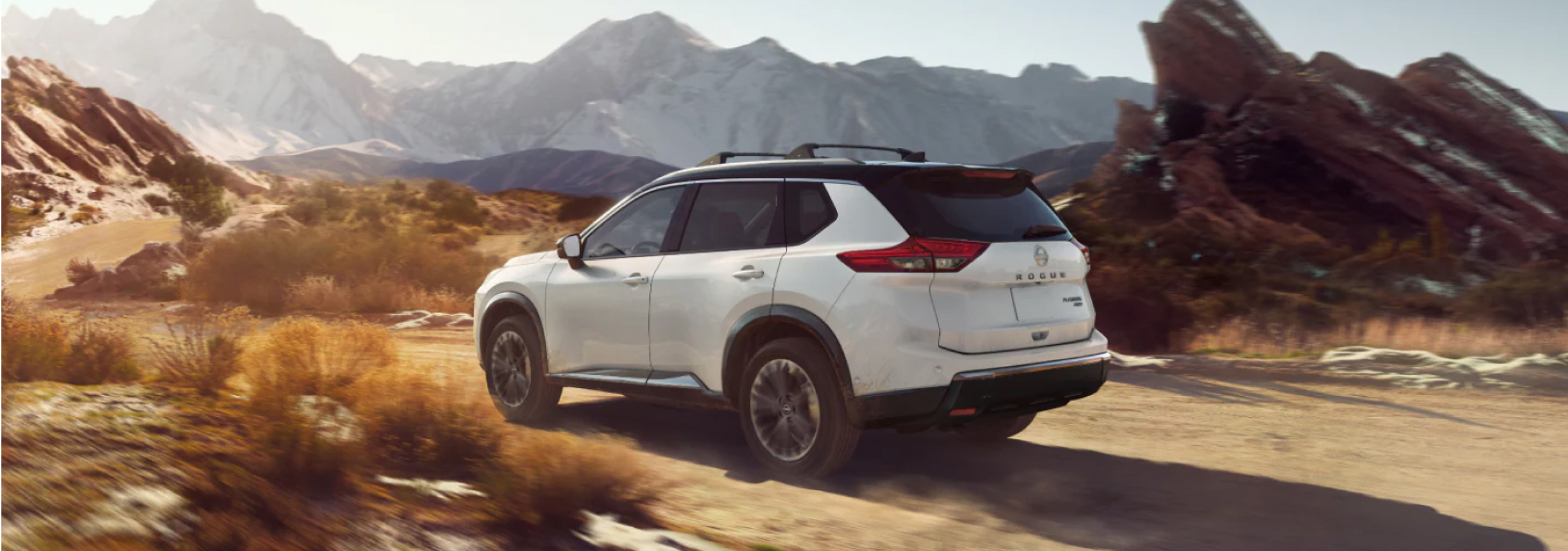 Side profile of a White Nissan SUV