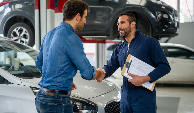 Technician shaking customers hand