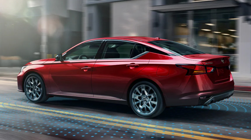 Red Nissan Sedan