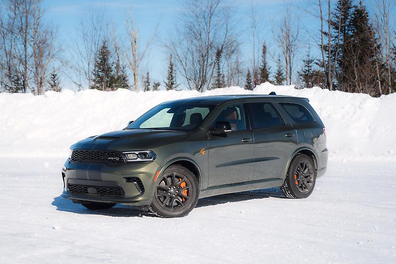 2026 Dodge Durango SRT in Green Machine parked in snow, showing Alberta winter capability