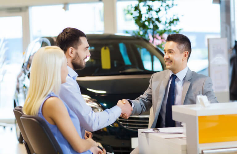 Applying for credit approval at a car dealership