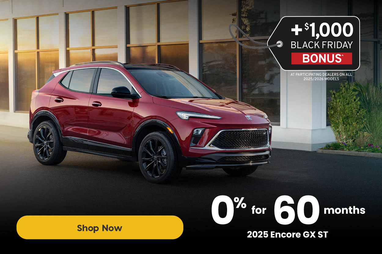 Black 2025 Chevrolet Silverado 1500 RST Crew Cab driving through a city street. Text reads: “+$1,000 Black Friday Bonus at participating dealers on all 2025/2026 models. 0% for 84 months on the 2025 Silverado 1500 RST Crew Cab. Ends November 26.” A yellow button reads “Shop Now.”