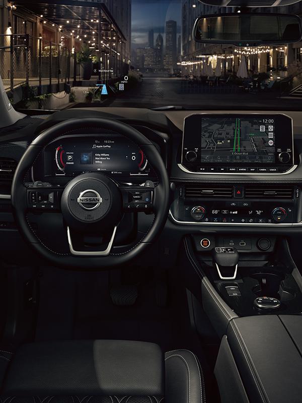 Interior view of the Nissan Rogue driver's seat.