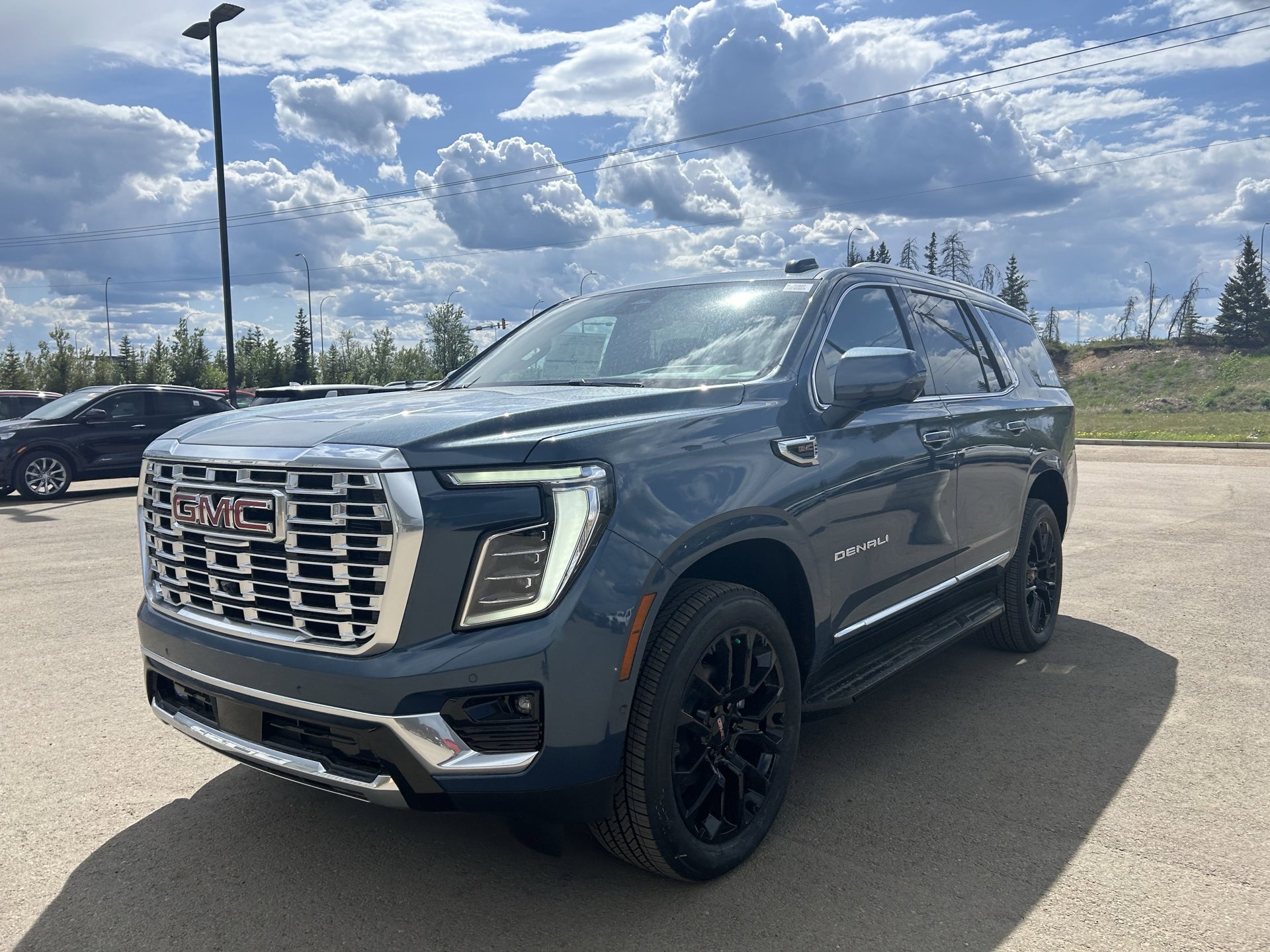 3/4 view of the 2025 GMC Yukon, available now at Summit GM