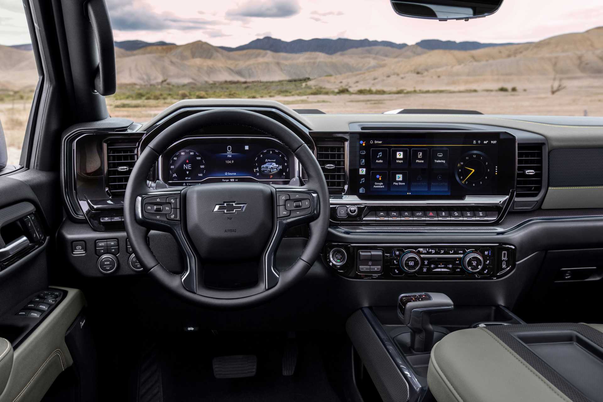 Chevrolet Silverado 1500 dashboard infotainment screen and wheel from drivers' POV