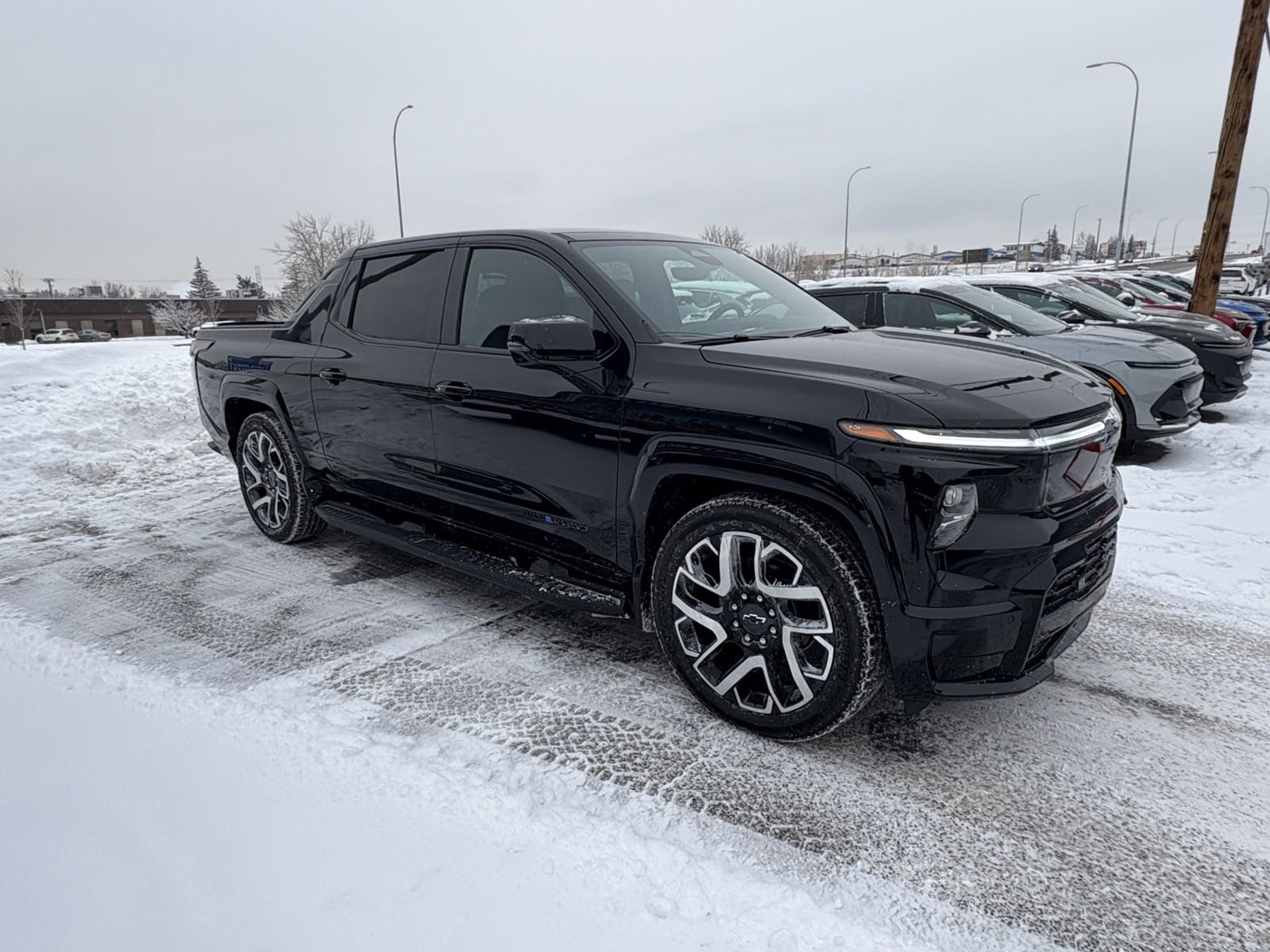 A Chevrolet Silverado EV parked at Summit GM
