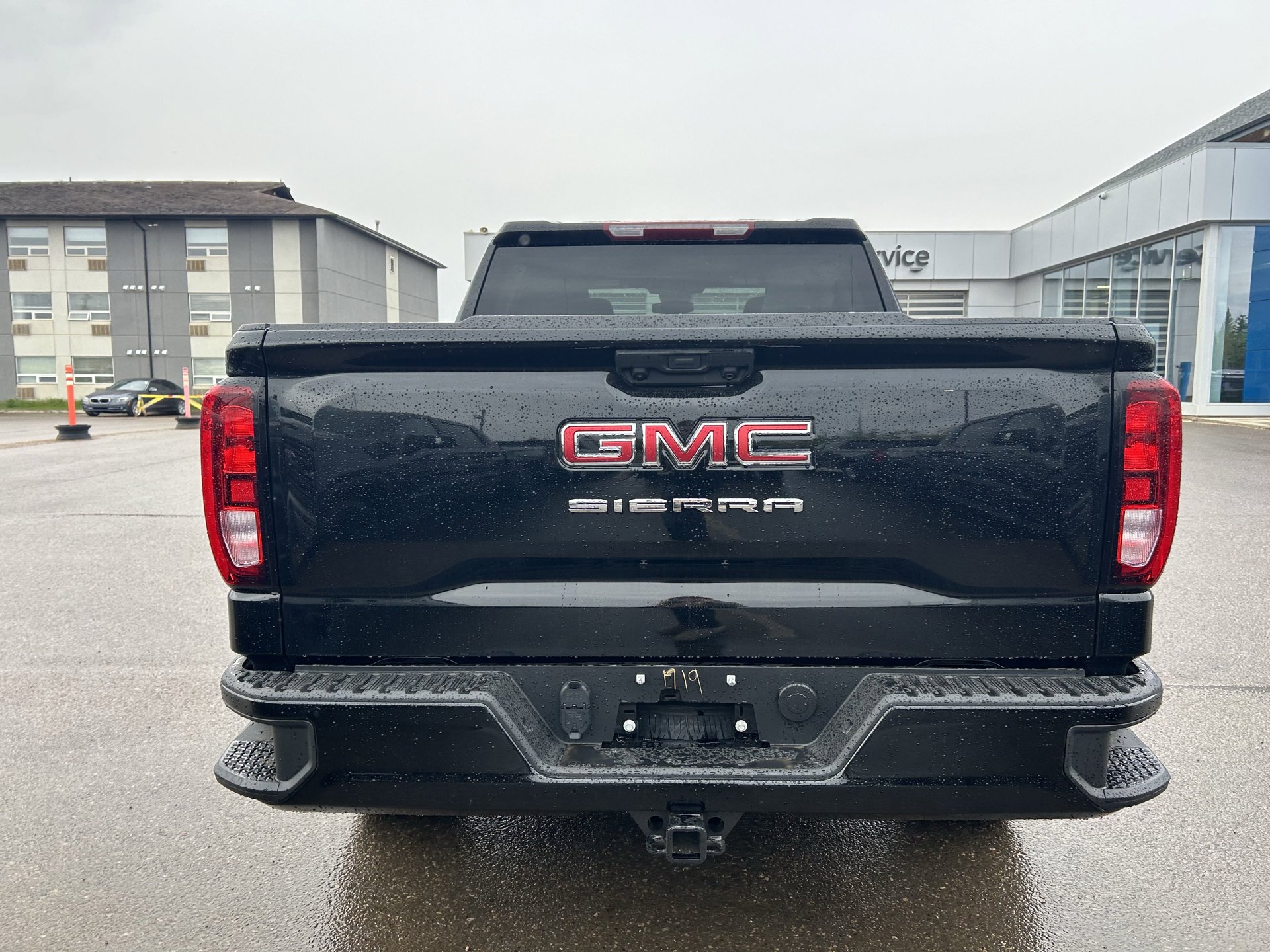 Rear view of the 2025 GMC Sierra parked at Summit GM