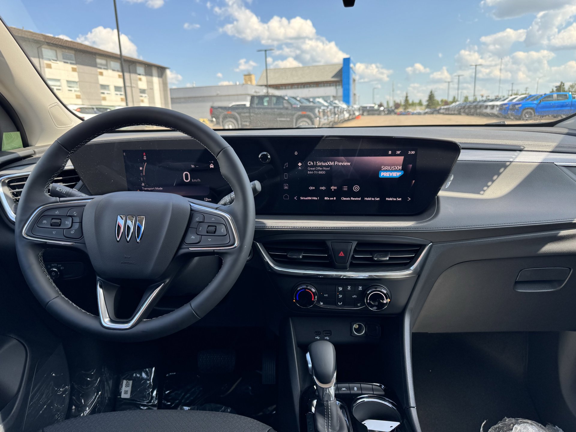 Close-up of the Encore GX's infotainment system