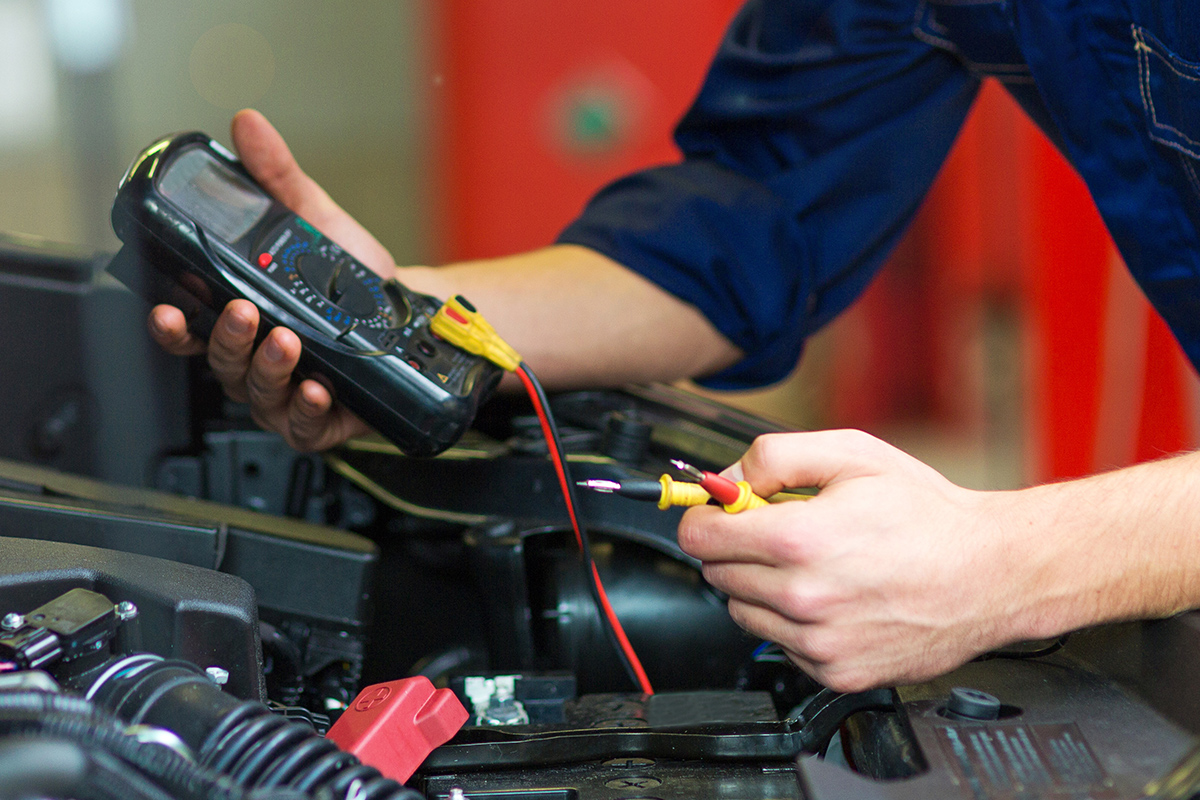 Man testing battery.