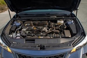 Engine appearance of the 2021 Toyota Avalon Hybrid available at Midlands Toyota