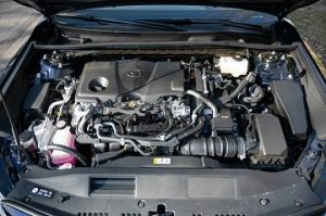 Engine appearance of the 2021 Toyota Camry Hybrid available at Midlands Toyota