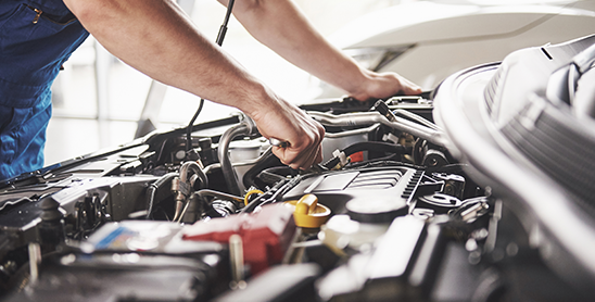 Mechanic working on engine