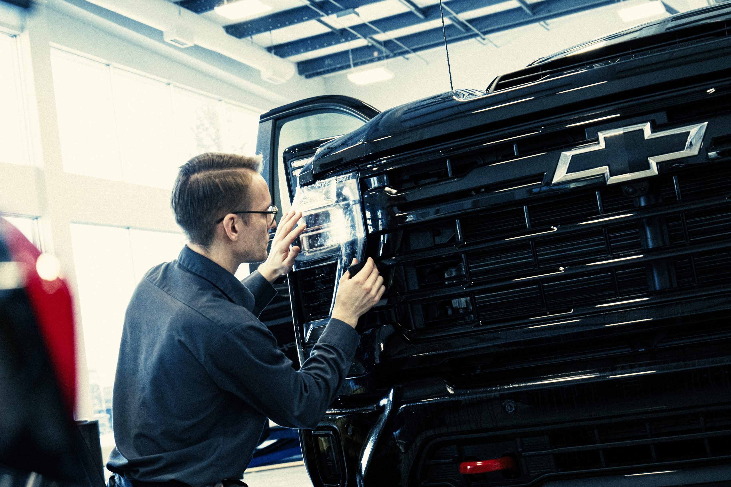 Tech Fixing Car Light