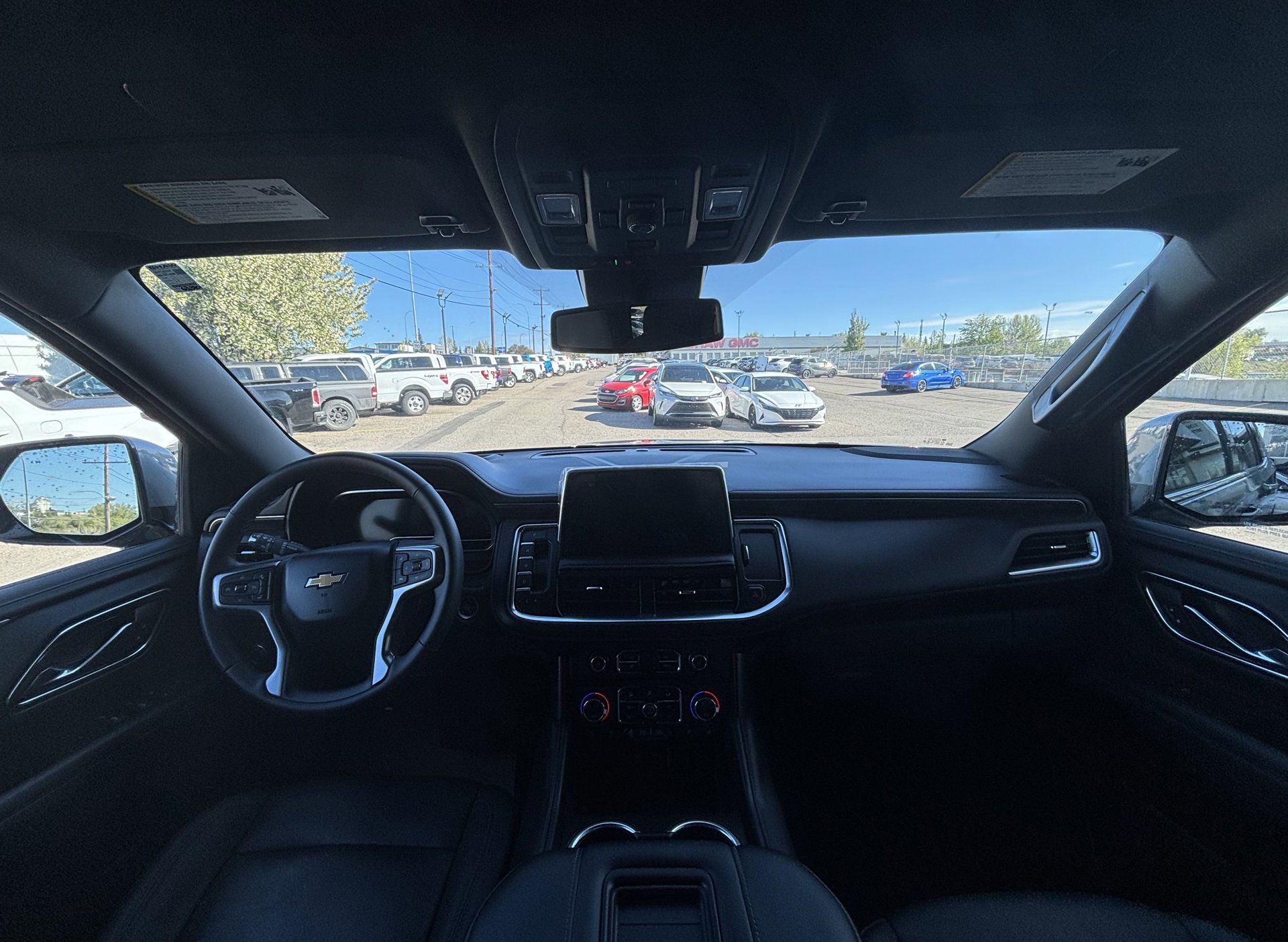 Interior view of the Chevy Tahoe, showcasing its tech-forward infotainment features.