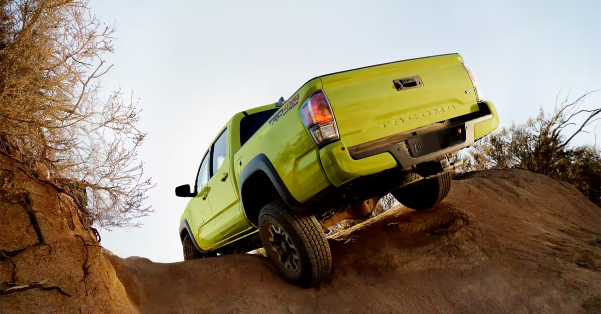 2023 Toyota Tacoma - Lime Green - Off-Roading up a Hill