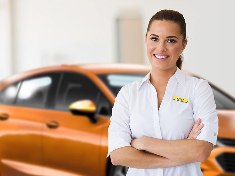 Chevrolet smiling woman customer service representative in a dealership.