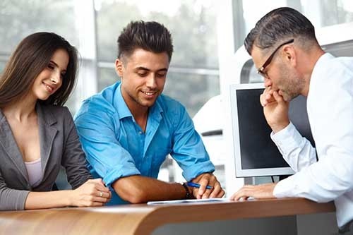 Couple discussing car buying options