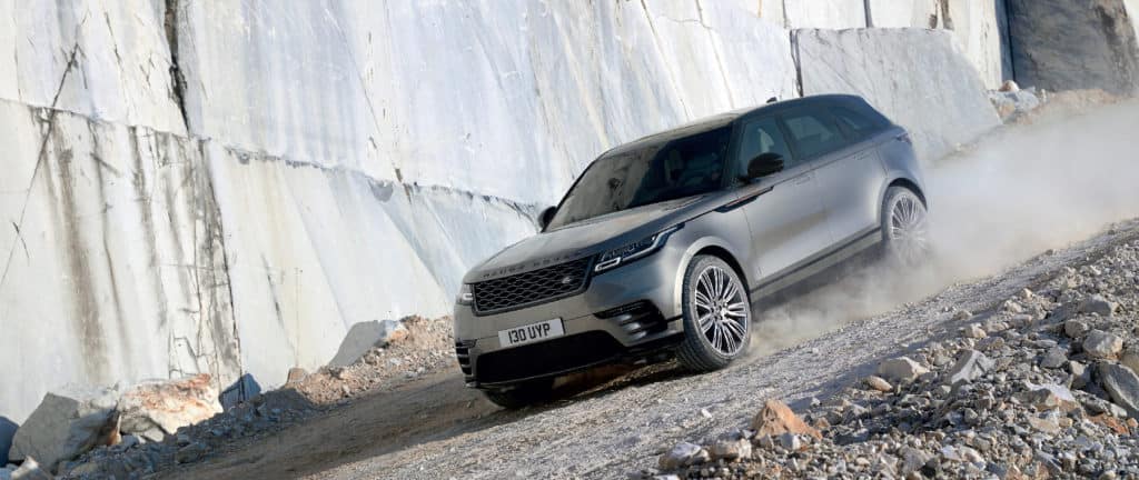 2019 Range Rover Velar off-roading among rocks