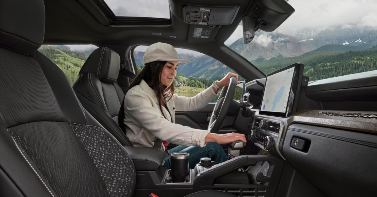 A woman driving the 2025 Toyota Tacoma