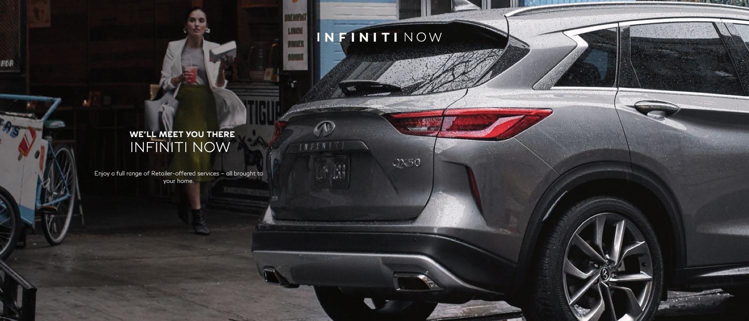 Enjoy a range of INFINITI at home services. Image of woman walking to her QX50.