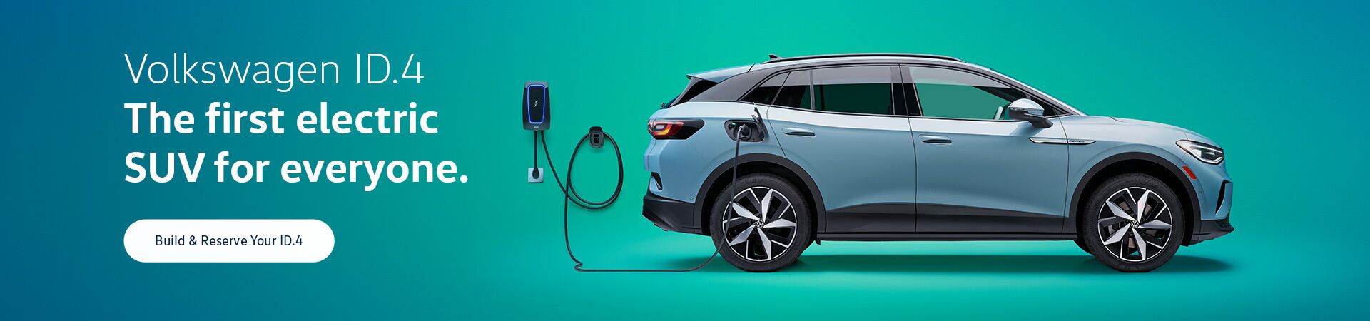 2023 ID.4 shown from the passenger side while connected to a charging station.