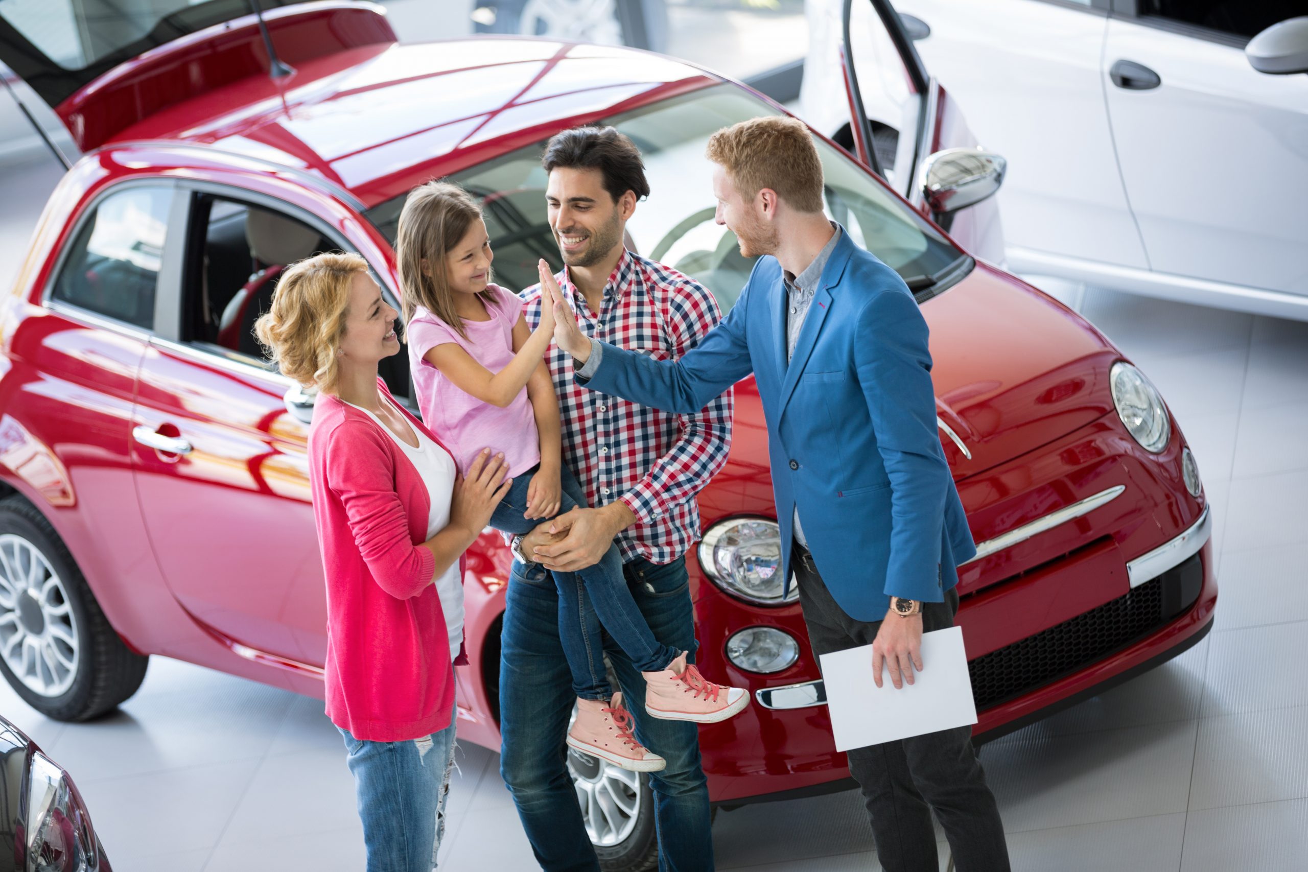 Family Negotiating with car salesman