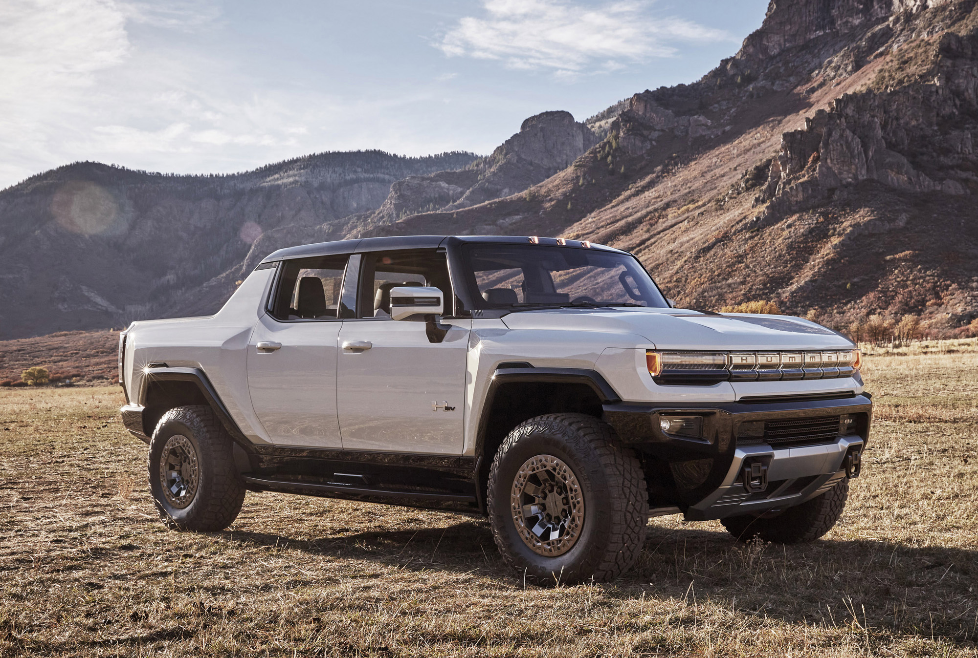 2024 Hummer EV parked in a field