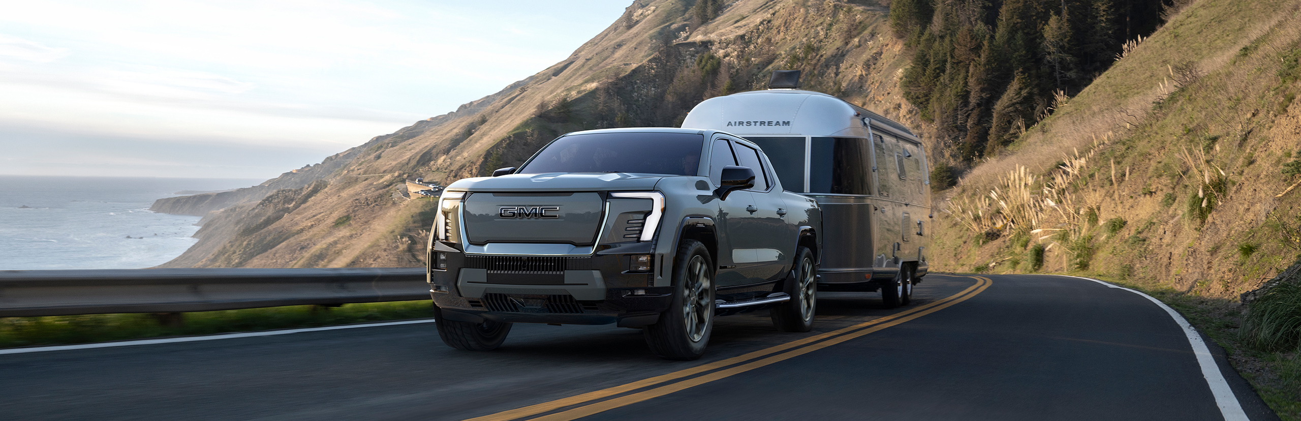 2024 GMC Sierra EV Towing a Trailer