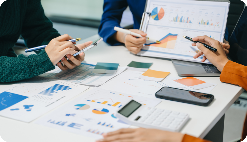 Group of people analyzing data to make a decision