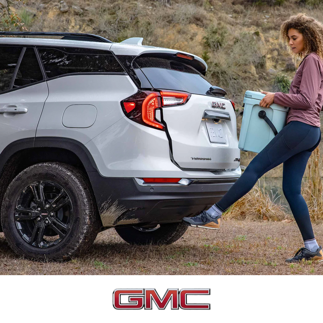 2023 GMC Terrain At4 Woman Opening Rear Hatch