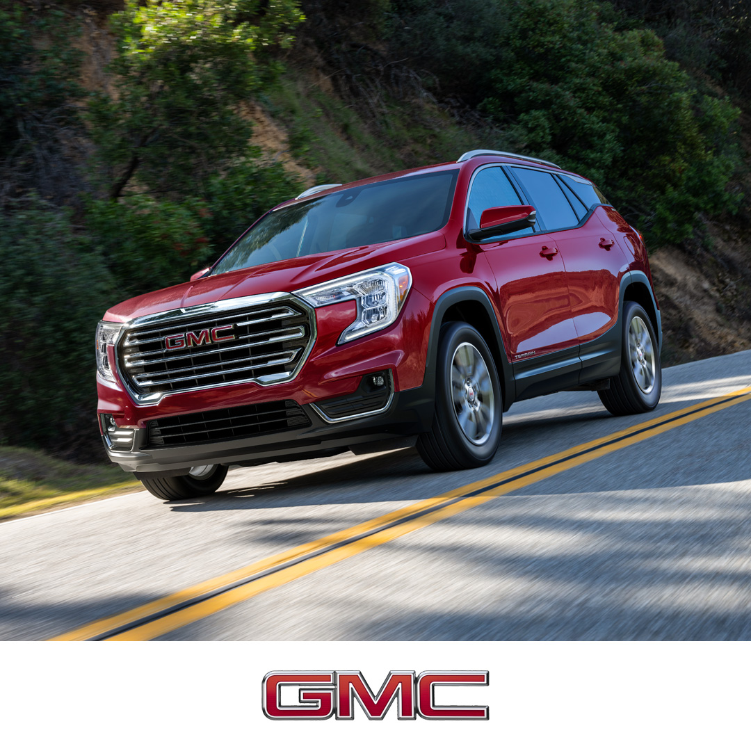 The Red 2024 GMC Terrain Driving On-Road